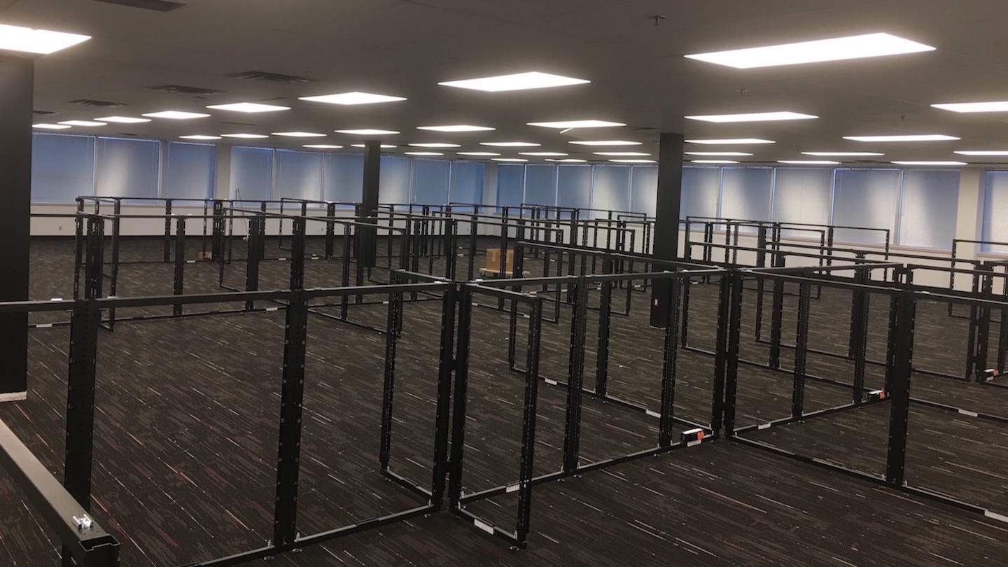 Cubicle frames installed in the empty office.