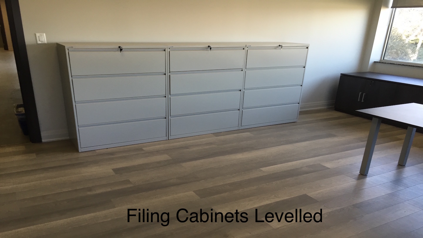 Filing cabinet leveled.